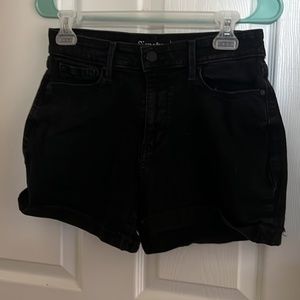 Black denim shorts